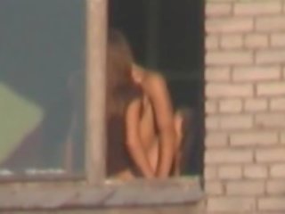 Spy Voyeur Captures Young Couple Fucking In Window